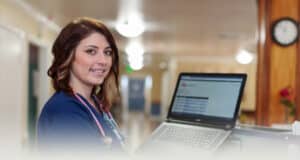 A nurse on a computer at Yuba City
